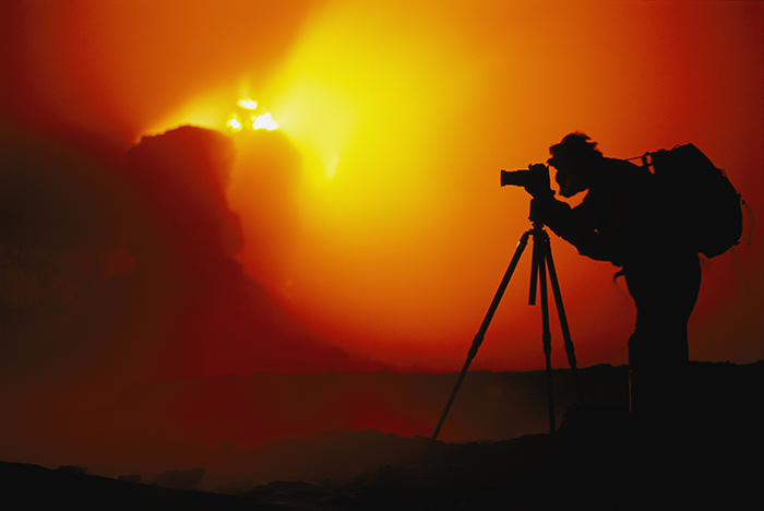 Frans Lanting at edge of volcano, Hawaii 