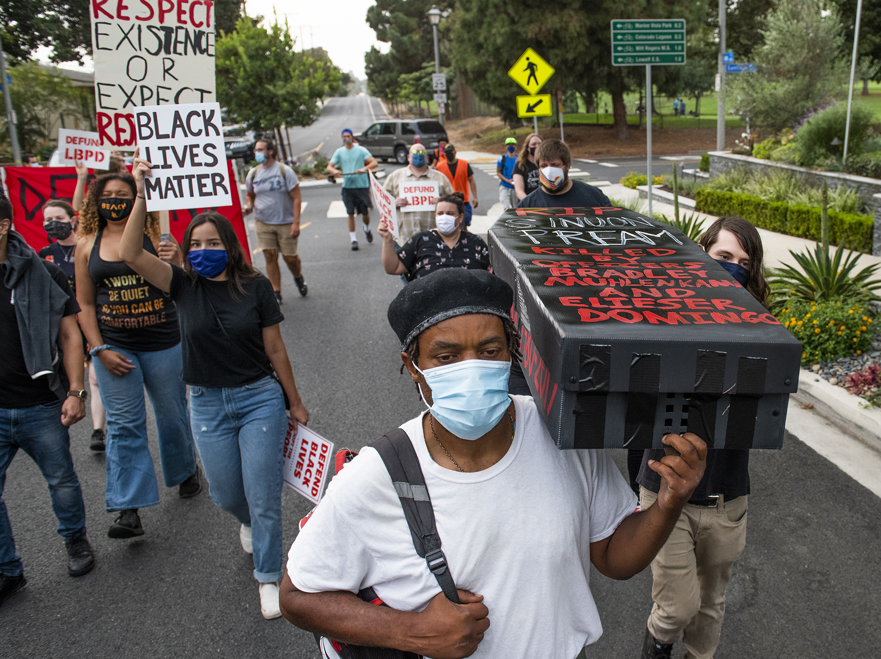 Protesters leave coffins on councilwoman’s lawn as city debates final budget