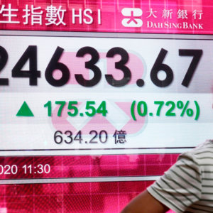 Asian Markets Mixed After Wall Street Rises on Dealmaking