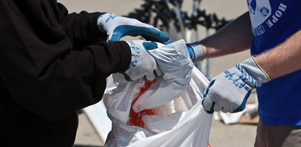 Leaders seek ways to resume neighborhood cleanups as trash piles up during pandemic