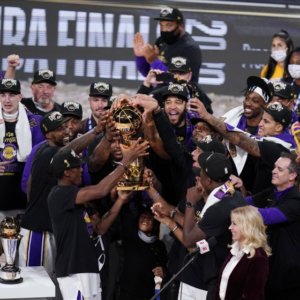 Lakers and Dodgers championship bids are no boon for local business. Blame COVID-19.