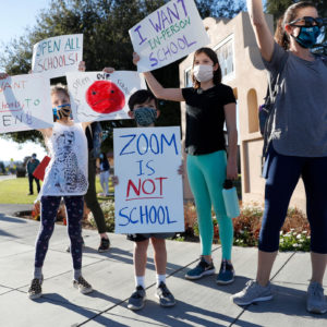 Who has the power to reopen California classrooms?