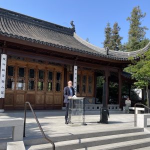 The Chinese Medicinal Garden's curator, Phillip Bloom, speaks to the press on May 21, 2024