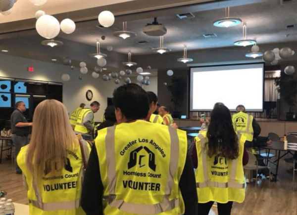 Volunteers gather at the deployment site for a homeless count.