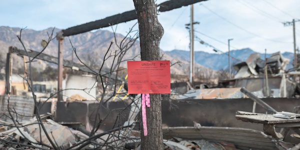 A property damaged in the LA wildfires deemed unsafe to enter is red-tagged.