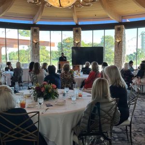 Attendees listen to a presentation during the Impact Las Vegas event.