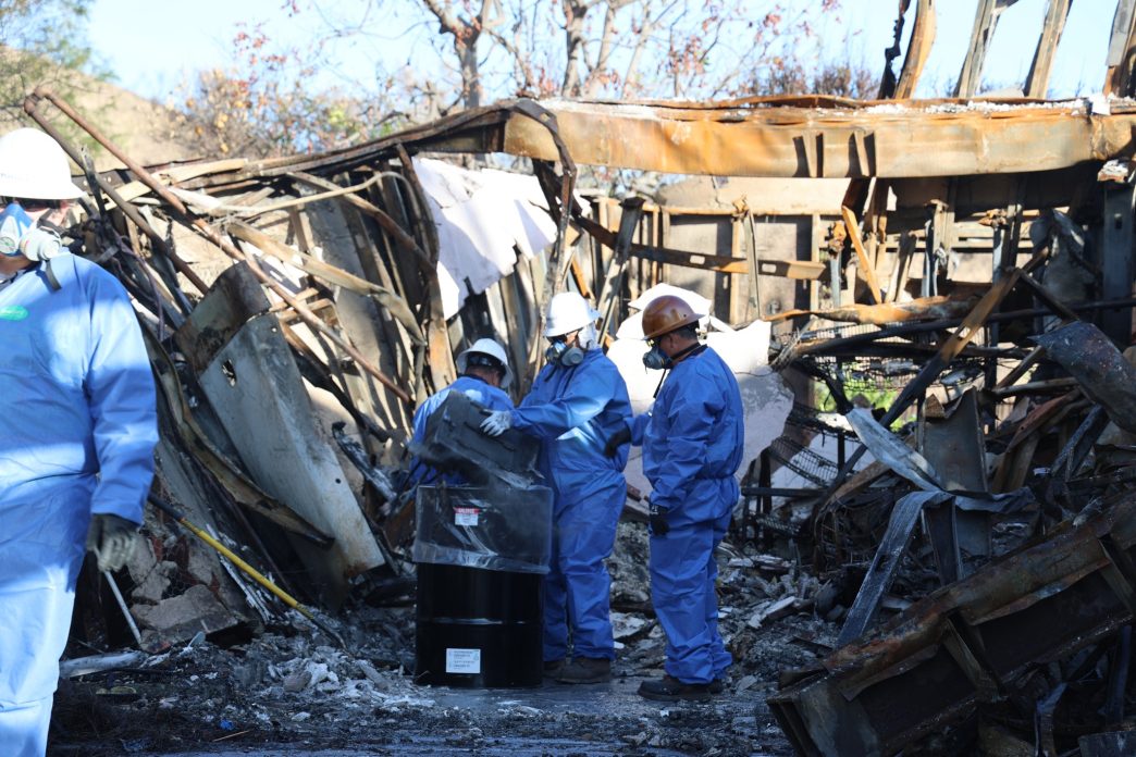 A crew removes hazardous materials from the Eaton Fire Zone.