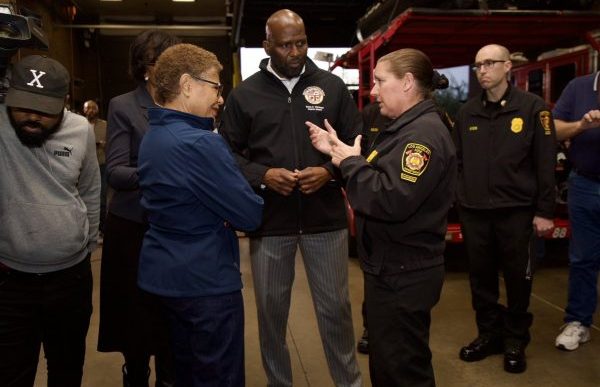 Then-LA Fire Chief Kristin Crowley, second from right, discusses rainstorm preparation with Mayor Karen Bass and city officials in February.