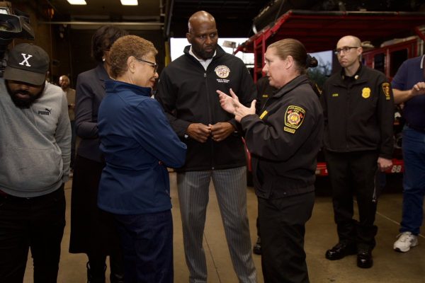 Then-LA Fire Chief Kristin Crowley, second from right, discusses rainstorm preparation with Mayor Karen Bass and city officials in February.