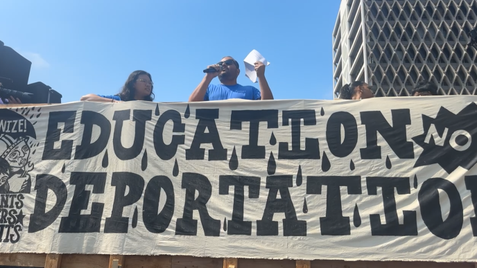 Activists decry immigration raids in the Los Angeles area during a "community stoppage" event.