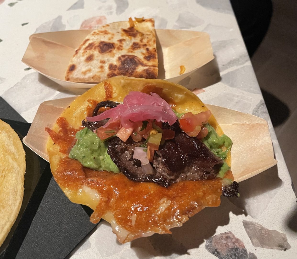 At front, the ribeye taco, at back, the shrimp and refried bean taco.