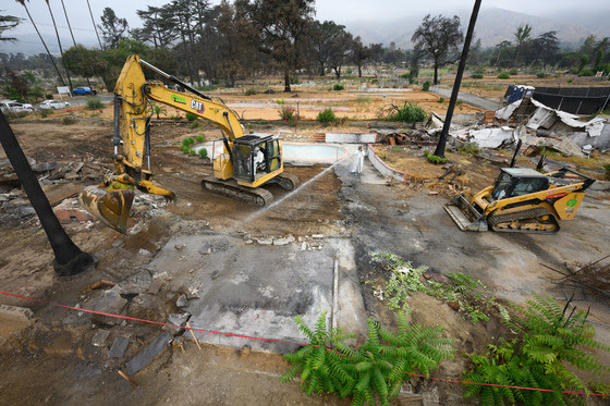 The U.S. Army Corps of Engineers completes debris removal on a residential property.