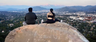 A young couple views the Inland Empire region from atop Mt. Rubidoux in Riverside.