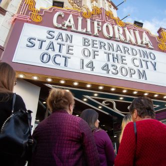 People file into the recently renovated California Theatre for the 2025 San Bernardino State of the City event.