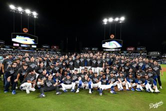 The Dodgers take a team photo after winning the 2025 NLCS.