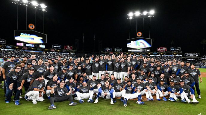 The Dodgers take a team photo after winning the 2025 NLCS.