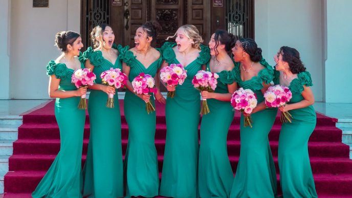 Serena Guo, second from left, reacts along with 2026 Rose Court to her being named Rose Queen.