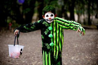 A young attendee in costume participates in a trick-or-treating adventure at a previous Howl-O-Ween Festival held at El Dorado Nature Center.