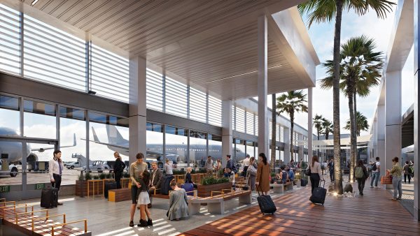 A family of travelers waits for their flight in the Long Beach Airport’s planned modernized concourse.