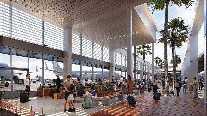A family of travelers waits for their flight in the Long Beach Airport’s planned modernized concourse.
