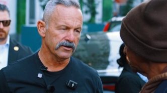 Riverside County Sheriff Chad Bianco speaks with an unidentified Angeleno during his tour through homeless encampments on Skid Row in downtown Los Angeles.