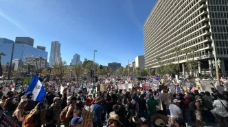 Thousands take to the streets of downtown LA as part of a national day of protest Friday, Jan. 30, 2026, against the Trump administration's crackdown on illegal immigration.