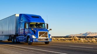 A cargo truck, semi, tractor trailer, big rig.