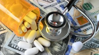 Money, cash, prescription drugs, stethoscope, health care.