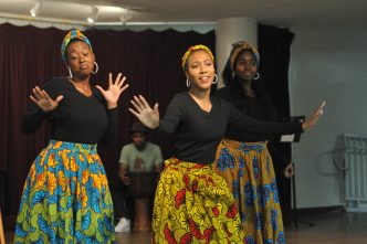 Performers showcase music and dance at the 2025 "Black Mosaic" event, which celebrates and honors the history and contributions of the Black community.