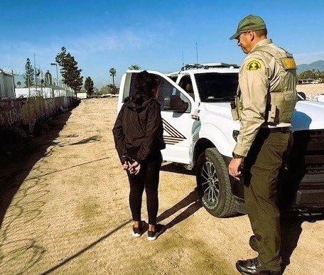 A San Bernardino County Sheriff’s Department deputy makes one of 15 arrests during Operation Shelter Me activities on Feb. 6.