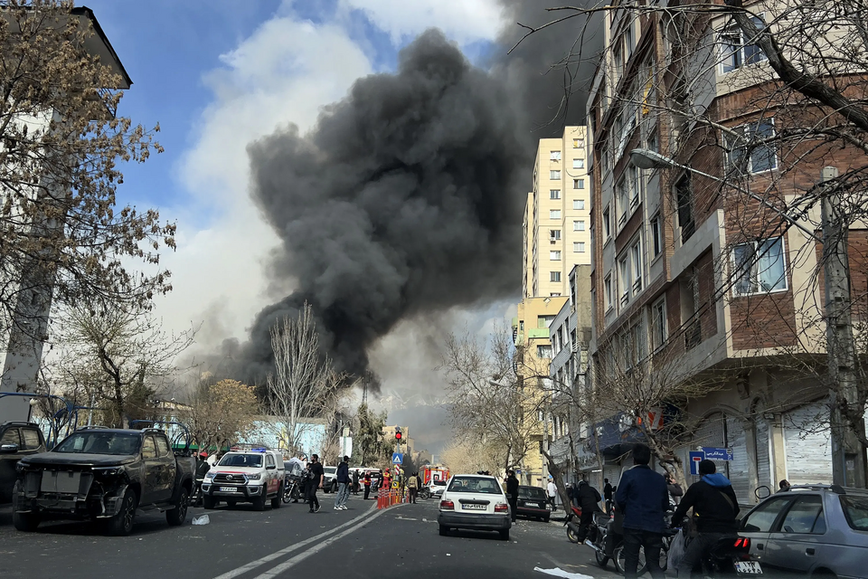 Smoke from an explosion fills the sky in Tehran after an attack by the U.S. military March 3, 2026.