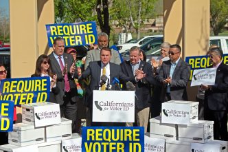 Assemblyman Carl DeMaio, R-San Diego, flanked by Rep. Ken Calvert, R-Corona, on his left, and on his right state Sen. Tony Strickland, R-Newport Beach, and Assemblywoman Leticia Castillo, R-Corona, deliver the first batch of voter ID petition signatures in Riverside.