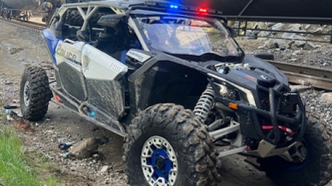 A police vehicle for enforcing off-road vehicle laws.