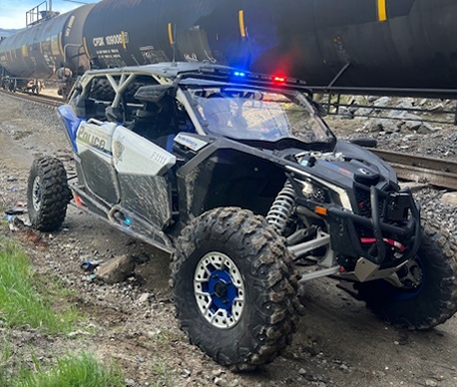 A police vehicle for enforcing off-road vehicle laws.