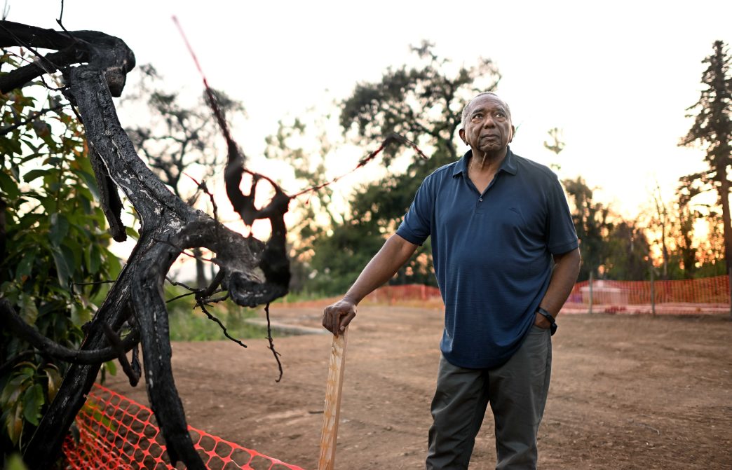John Jackson stands on the Altadena property where his home stood prior to the deadly, destructive Eaton Fire in January 2025.