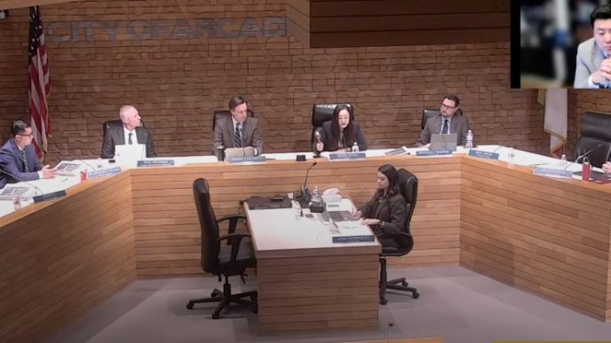 Mayor Eileen Wang, fifth from left, adjourns the May 5 City Council meeting, the last meeting prior to her resignation Monday following the announcement of a federal plea deal in which she admitted acting as an agent of the Chinese government.