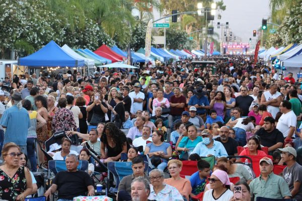 Residents experience an evening at Baldwin Park’s Street Market in the Park.