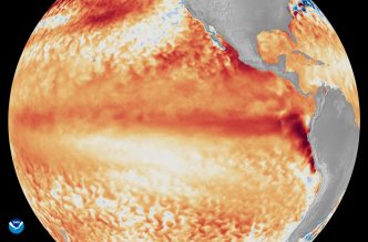 Satellite imagery shows the difference from average sea surface temperatures at the equator in the tropical Pacific Ocean — various shades of red and orange indicate level of warmth — during the first week of June 2026, as compared with the baseline used by NOAA’s Coral Reef Watch.