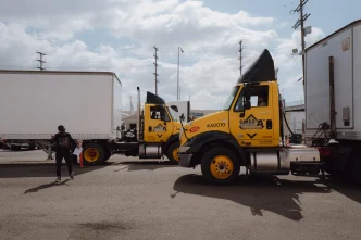An instructor teaches students about air brake releases at Dolphin Trucking School in the city of Vernon on March 11, 2024.