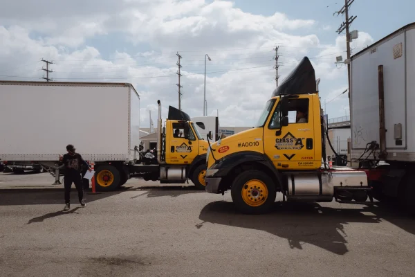 An instructor teaches students about air brake releases at Dolphin Trucking School in the city of Vernon on March 11, 2024.