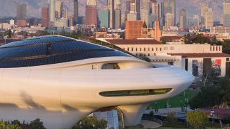 The new Lucas Museum in Exposition Park, with the downtown LA skyline in the background.