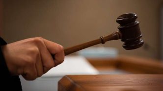 A judge bangs a gavel.