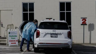 Parkside Pediatrics providers assess a patient with measles symptoms in Spartanburg, South Carolina. | Photo courtesy of Juan Diego Reyes // For The Washington Post via Getty Images/Stacker