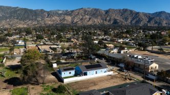 An aerial view in February 2026 of Altadena homes in the Eaton Fire burn area.