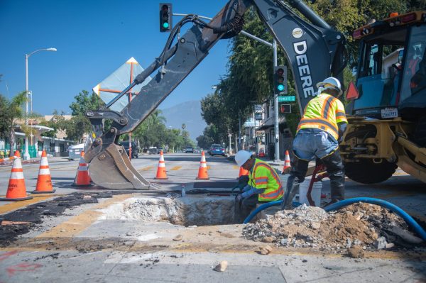 A PWP crew opens the street to replace a water main on Oak Knoll Avenue.