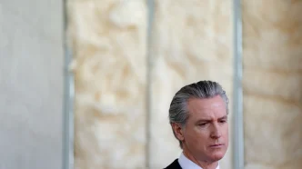 Gov. Gavin Newsom joins local officials to sign legislation intended to modernize the financing and delivery of affordable housing in California during a press conference in Oakland on July 13, 2026.