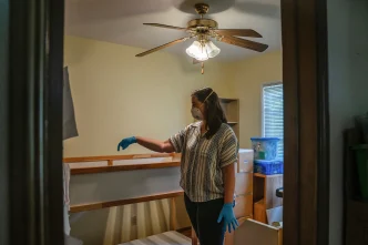 Gil Barel in her son’s room in Pasadena on Aug. 2, 2026. Barel and her family are still waiting for their home, a duplex they had rented for eight years before the January 2025 Eaton Fire, to be cleaned up and free of toxic materials before they move back in.