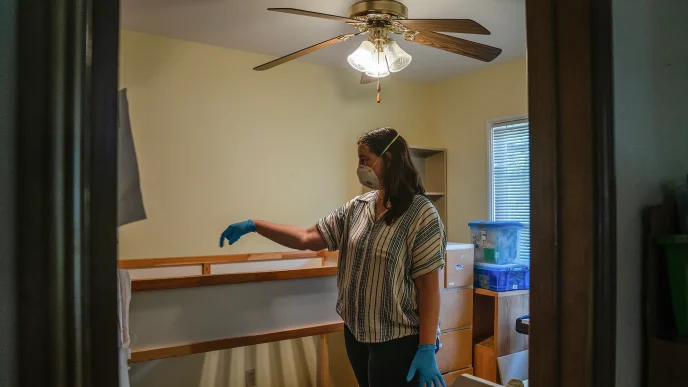 Gil Barel in her son’s room in Pasadena on Aug. 2, 2026. Barel and her family are still waiting for their home, a duplex they had rented for eight years before the January 2025 Eaton Fire, to be cleaned up and free of toxic materials before they move back in.