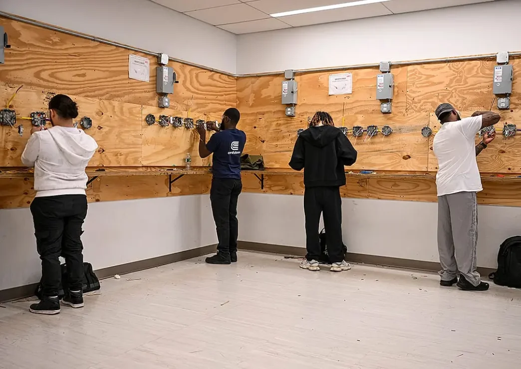 Students participate in an Advanced Electrical program class at Apex Technical School in New York City's Manhattan borough.