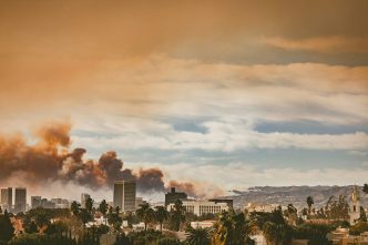 Smoke from the Eaton fire in Altadena is visible from Koreatown in Los Angeles.